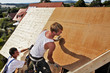 carpenters constructing a dormer