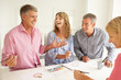 Mid age couples painting with watercolors