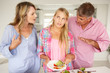 Parents making teenage daughter do chores at home