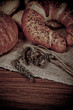 Composition of fresh bread on wood Composition of fresh bread on wood