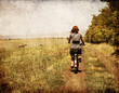 Redhead girl with cycle.