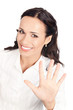 Businesswoman showing five fingers, on white