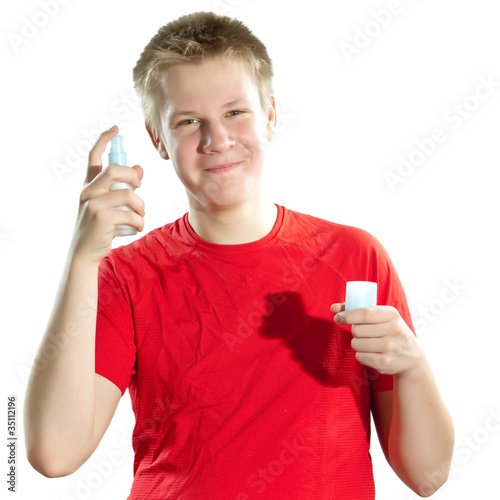 Photo: The boy, the teenager with a cream for a problem youthful skin The boy, the teenager with a cream for a problem youthful skin