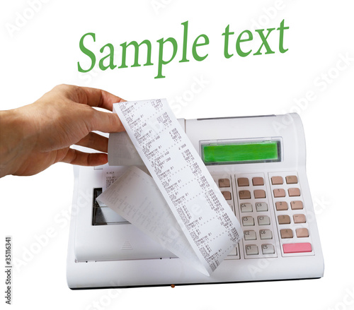 Photo: Close-up image of a shop-assistant's hand pressing a key of an e Close-up image of a shop-assistant's hand pressing a key of an e