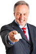 Senior businessman offering a blank card