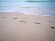 south beach footprints in sand