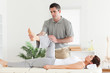 Chiropractor working with a customer