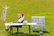 Foto: Businesswoman in sunny meadow relax nature office Businesswoman in sunny meadow relax nature office