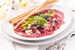 Carpaccio mit Parmesan und Oliven