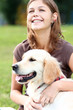 Foto: Young woman with her dog Young woman with her dog