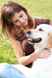 Foto: Young woman with her dog Young woman with her dog