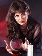 Young woman  with crystal ball.