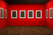 Front perspective of gallery room. Empty blank frames in Showroo