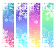 Four abstract vertical winter banners with white snowflakes Four abstract vertical winter banners with white snowflakes