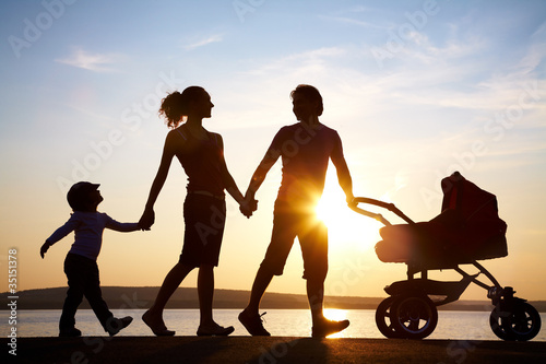 Photo: Family walk at sunset Family walk at sunset