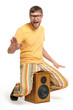 Cool funny dude dancing while sitting on the speaker Cool funny dude dancing while sitting on the speaker