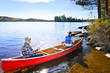 Canoeing near lake shore