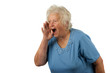 Senior woman is shouting loud, on white background