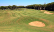 Golf course with bunker and water hazard. Golf course with bunker and water hazard.