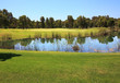 Golf course with water hazard. Golf course with water hazard.