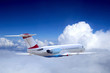 Photo: Airplane at fly on the sky with clouds Airplane at fly on the sky with clouds