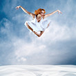 Jump of ballerina with dress of milk