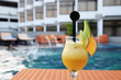 orange juice at swimming pool outdoor orange juice at swimming pool outdoor