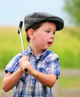 Litte boy golfer