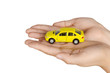 Toy car in hand Toy car in hand