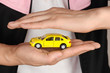 Toy car in hand Toy car in hand