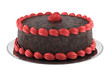 round chocolate cake with pink cream isolated on white