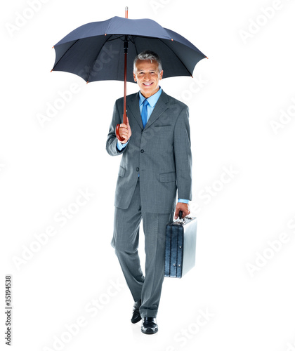 Photo: Safe business - Senior businessman going to work Safe business - Senior businessman going to work