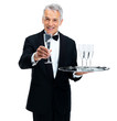 Waiter greets you with glasses of wine