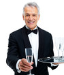 Senior waiter giving you a glass of welcome drink
