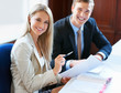 Smiling business people