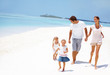 Photo: Joyful family together on the beach Joyful family together on the beach