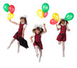 Happy schoolgirl jumping with colorful balloons in his hand.