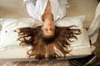 Young beautifull lady with long hair on romantic bed Young beautifull lady with long hair on romantic bed