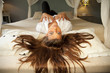 Young beautifull lady with long hair on romantic bed Young beautifull lady with long hair on romantic bed