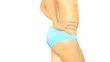 Video: Woman checking skin on her buttock, isolated on white Woman checking skin on her buttock, isolated on white