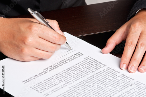 Photo: Signing a Document Signing a Document