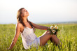 woman sitting on field woman sitting on field