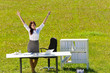 Businesswoman sunny meadow nature office hands-up
