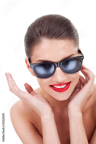 Photo: seductive woman in sunglasses seductive woman in sunglasses