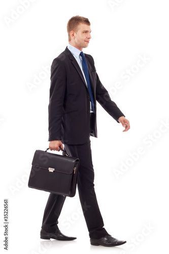 Foto: businessman walking businessman walking