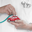 To check a car very closely with stethoscope