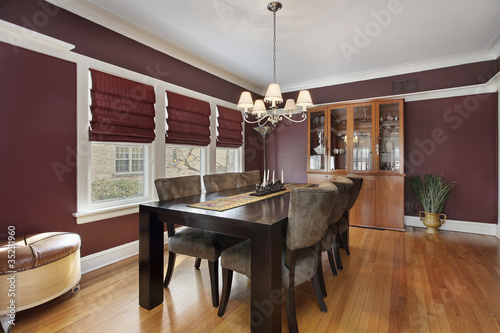 Photo: Dining room with maroon walls Dining room with maroon walls