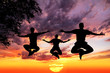 jumping Yoga silhouettes in lotus