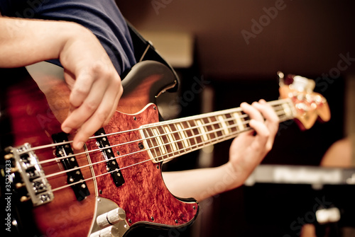Photo: musician playing a guitar musician playing a guitar