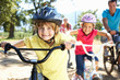 Young family on country bike ride